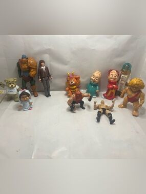 Random lot 80s vintage toys He-man chipmunks WWE Zellers Mancini